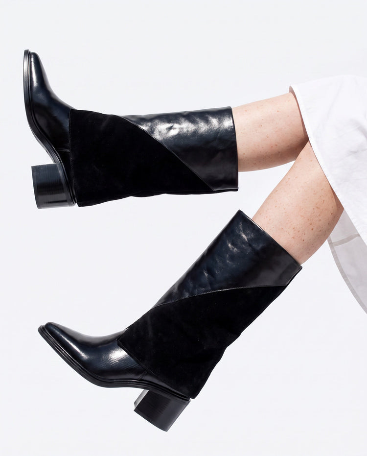 MJUS FW26 collection, black knee-high boots