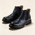 A.S.98 HENDRICK Black Chelsea boots, pair three-quarter view 